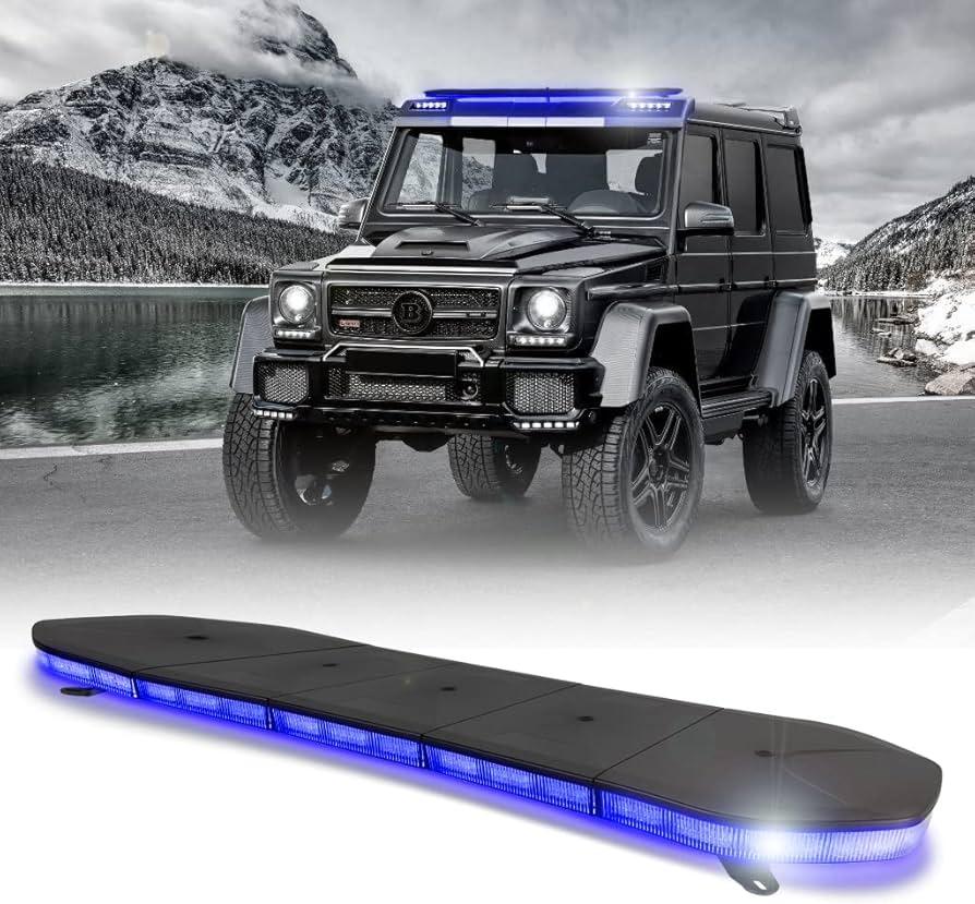 Luces de puente azul homologadas instaladas en Jeep negro frente a un lago y montañas nevadas